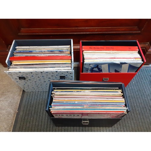 174 - Three record travel cases containing mainly Swing and Jazz records to include Ella Fitzgerald, Woody... 