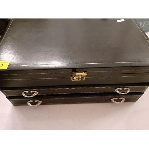 143 - A large black leather jewellery chest containing a group of vintage necklaces to include a multi-str... 