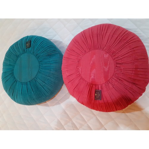 139 - A pair of 1970's French Marie-Claude Fremau of Paris, silk circular cushions, one in green and the o... 