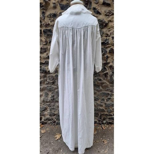 146 - A late 19th/early 20th Century gents white cotton, full length nightgown with smock collar and front... 