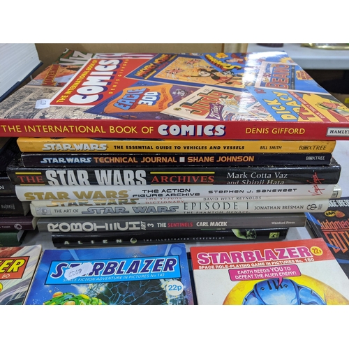 250 - Books-A group of science fiction books and ceramics to include The Encyclopaedia of science fiction,... 