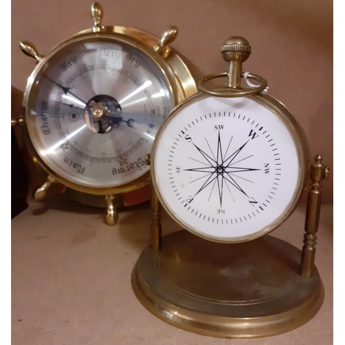 248 - A ship wheel barometer in brass case, a ship's clock, a mid 20th Century mantle clock, a Rototherm t... 