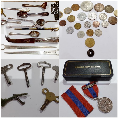 252 - A mixed lot of silver and silver plated collectables, clock keys, coins and Imperial Service medal i... 