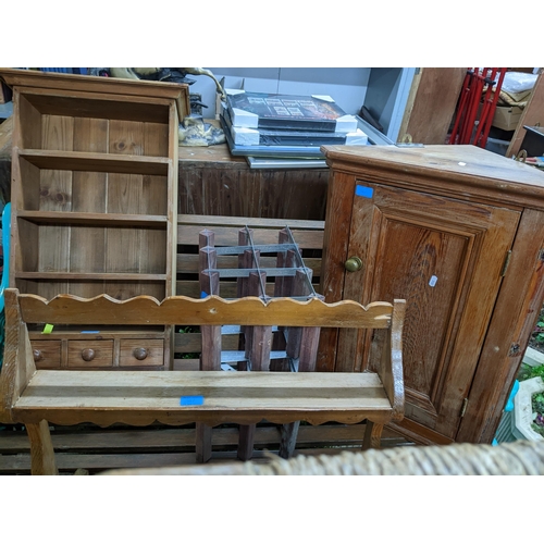 341 - A group of small pine furniture items to include a corner cabinet, two wall hanging shelf units, a s... 