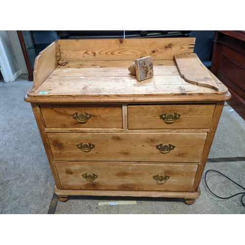 349 - Victorian pine chest of drawers, three quarter galleried back, over a top with moulded edge, two sho... 