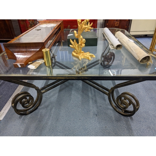 352 - A contemporary glass topped and wrought iron coffee table 45x110x110cms
Location: A3F/RAB