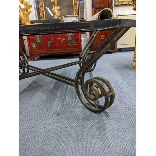 352 - A contemporary glass topped and wrought iron coffee table 45x110x110cms
Location: A3F/RAB