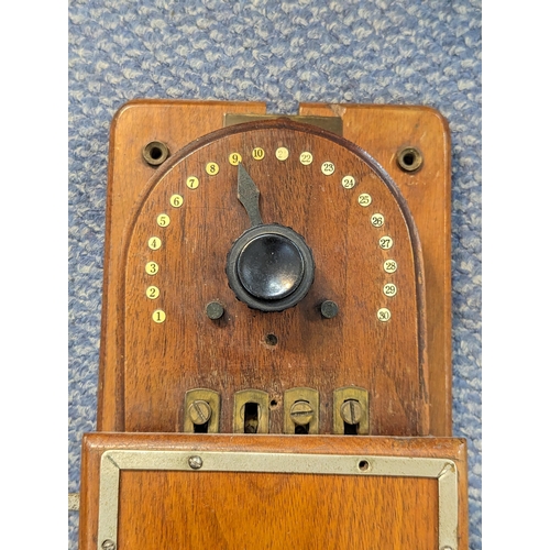 59 - A vintage Gent & Co Wall mounted 'secret service' telephone in a mahogany case
Location:LAF