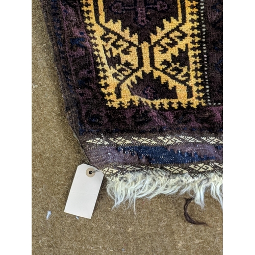 69 - A Belouch prayer rug with geometric motifs
Location:A2F