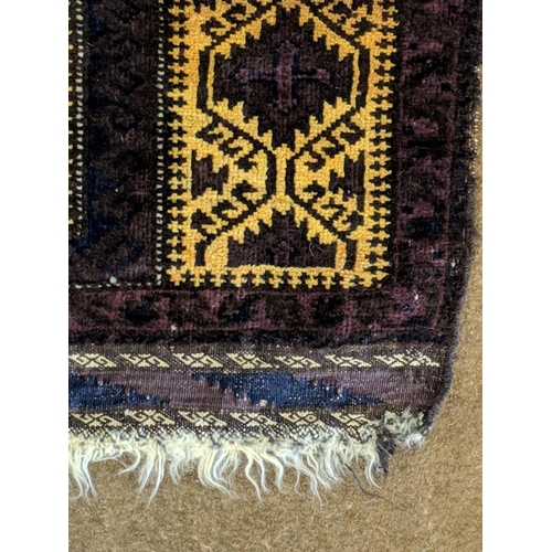 69 - A Belouch prayer rug with geometric motifs
Location:A2F