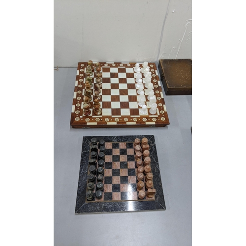 93 - A marble chess board having carved chess pieces
Location:FSR