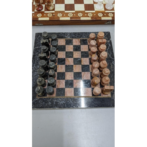 93 - A marble chess board having carved chess pieces
Location:FSR