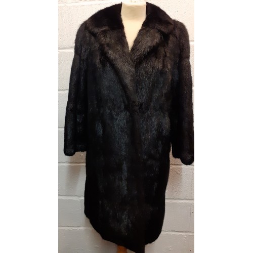 159 - A late 20th Century black rabbit fur coat 42