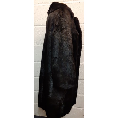 159 - A late 20th Century black rabbit fur coat 42