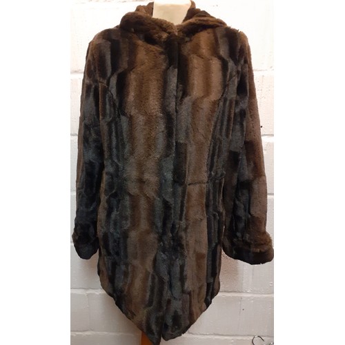 159 - A late 20th Century black rabbit fur coat 42