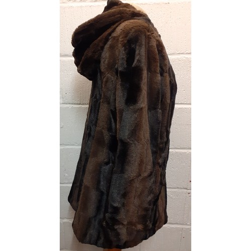 159 - A late 20th Century black rabbit fur coat 42