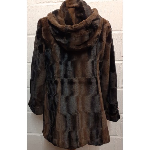 159 - A late 20th Century black rabbit fur coat 42