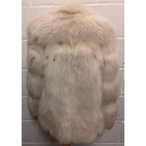 A quantity of 2 vintage jackets and one faux fur coat to include a late  20th Century arctic fox jack