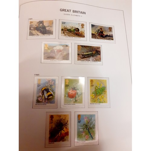 253 - A stamp collection comprising a Queen Elizabeth II album of 1950's and later British stamps, an empt... 