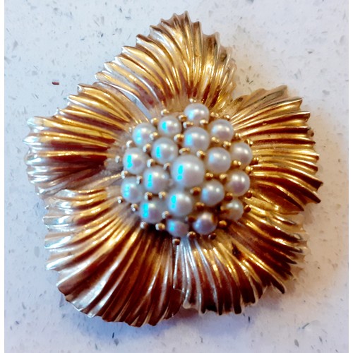 141 - A 14ct gold and seed pearl floral brooch, stamped 14k.
Location: CAB5