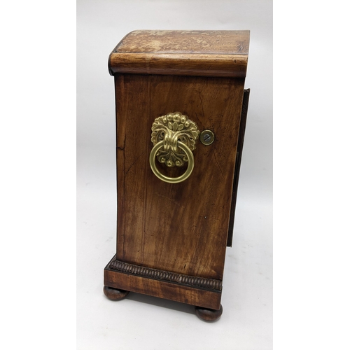 497 - A Regency mahogany bracket clock, the arched top case carved with scrolls, motif to the centre, bras... 