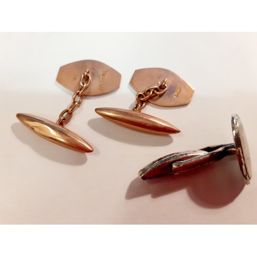 101 - A pair of 20th Century 9ct gold cufflinks, 5.65g, and a single silver cufflink.
Location: CAB2