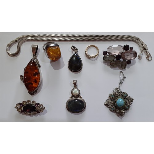 270 - A quantity of costume jewellery to include a Modernist white metal and amber pendant and ring, a whi... 