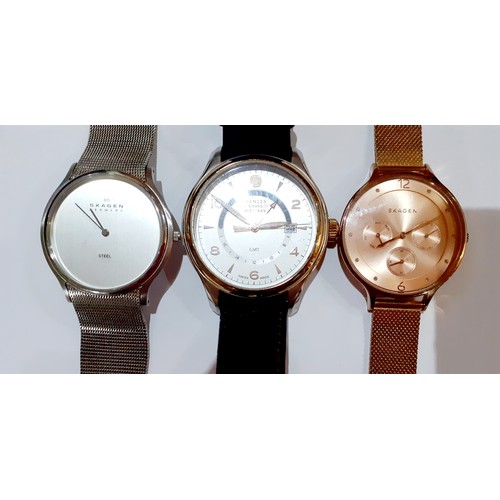 269 - Three modern watches comprising a gold tone and brushed steel Wenger Swiss Military watch with brown... 