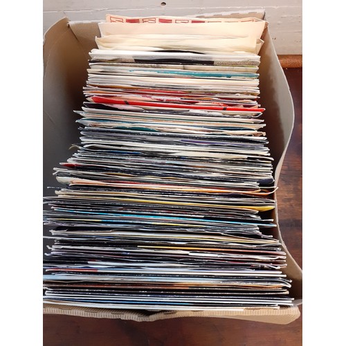 278 - A quantity of mainly 1970's and 1980's 45rpm singles to include a Wizzard demo record, Iron Maiden a... 