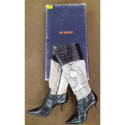 160 - A Le Silva pair of brown two-tone snakeskin boots, European size 40, having a 4