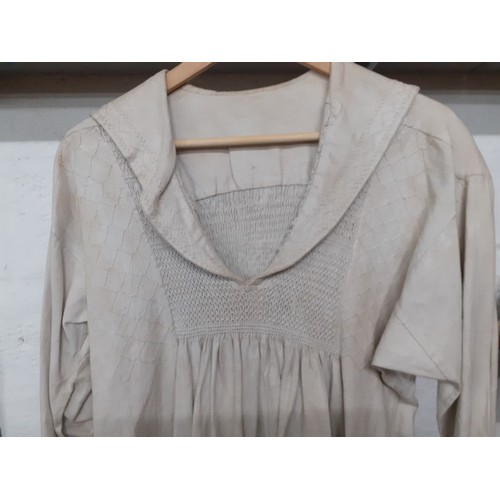 288 - A 19th Century taupe farmer's cotton twill smock, 38