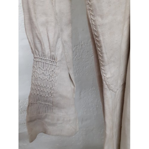 288 - A 19th Century taupe farmer's cotton twill smock, 38