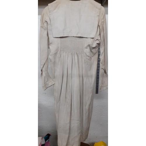 288 - A 19th Century taupe farmer's cotton twill smock, 38