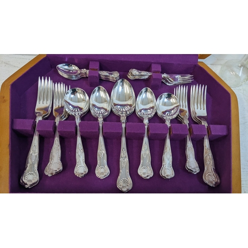 308 - A silver plated Kings pattern canteen of cutlery, together with Continental small picture frame, mat... 