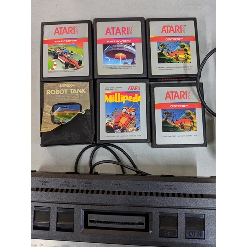 380 - A boxed Atari video computer system 2600 with six games, Robot Tank, Millipede, Centipede 1987, Cent... 