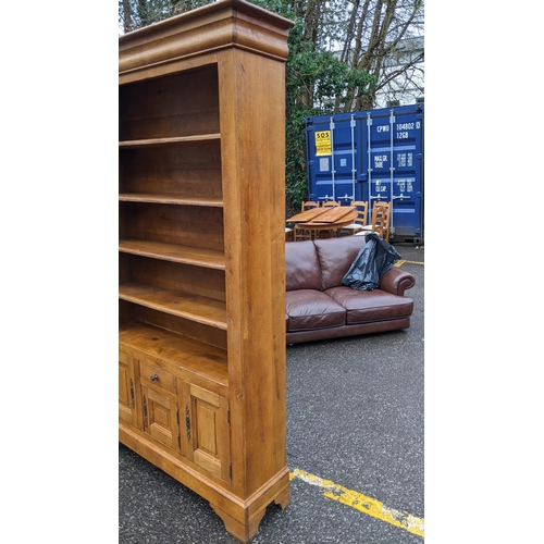 322 - A modern French style oak bookcase cabinet with four shelves, a drawer and three doors
Location: CON... 