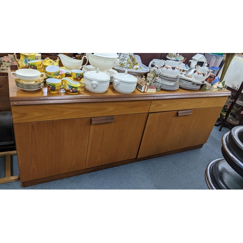 524 - A mixed lot to include a mid 20th century teak sideboard having two drawers above cupboard doors and... 