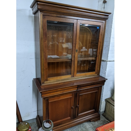 548 - A Wills & Gambier mixed wood side cabinet bookcase, twin glazed display doors with adjustable intern... 