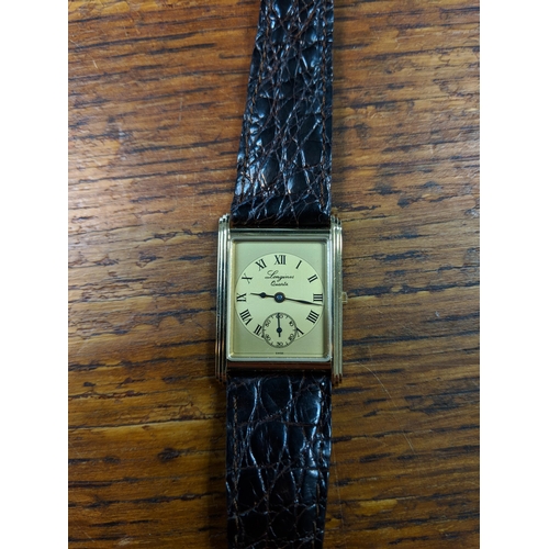 501 - A gentleman's Longines wristwatch with a square face with roman numeral dial and subsidiary seconds
... 