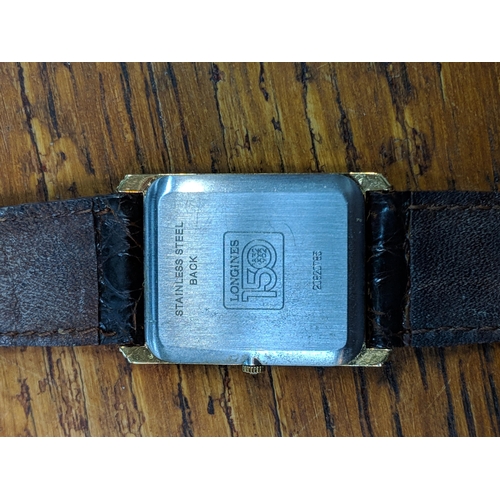 501 - A gentleman's Longines wristwatch with a square face with roman numeral dial and subsidiary seconds
... 