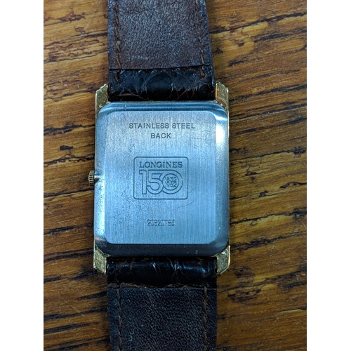 501 - A gentleman's Longines wristwatch with a square face with roman numeral dial and subsidiary seconds
... 