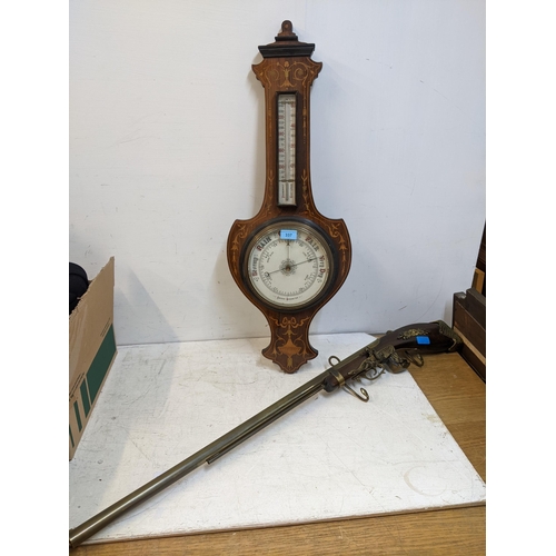 532 - A Edwardian inlaid walnut barometer, shield shaped case, with thermometer, along with an English rep... 