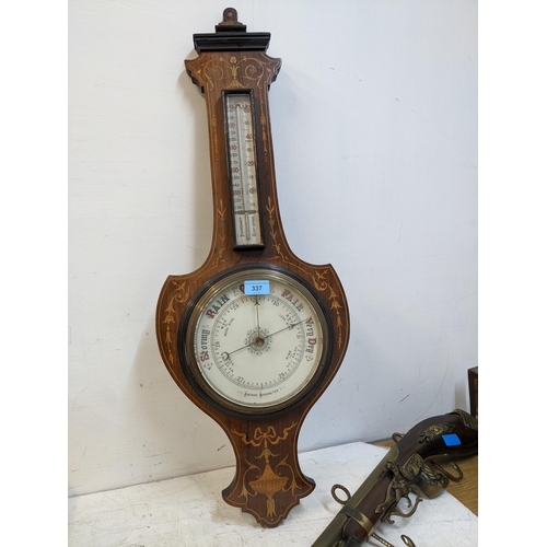 532 - A Edwardian inlaid walnut barometer, shield shaped case, with thermometer, along with an English rep... 