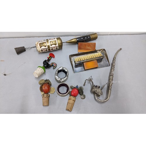 505 - A mixed lot to include an Art Deco crumb tray with brush, corks and a white metal pipe together with... 