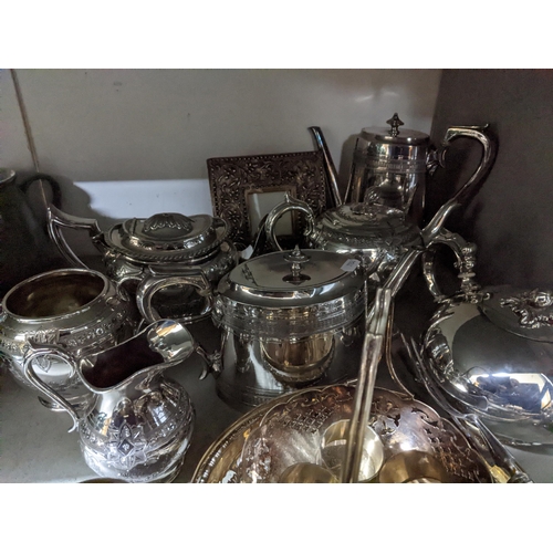 410 - A selection of silver plate to include Victorian teapots, a photograph frame, and other items Locati... 