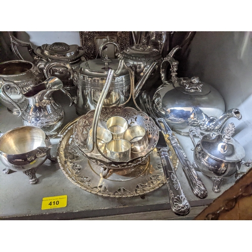 410 - A selection of silver plate to include Victorian teapots, a photograph frame, and other items Locati... 