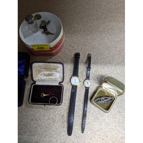 429 - A mixed lot of jewellery, watches, and other items to include a leather wallet with silver mounted c... 