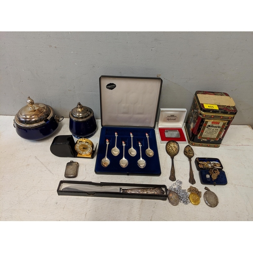 495 - A mixed lot to include cased set of silver plated spoons, a consul diplomat lighter, a small quantit... 