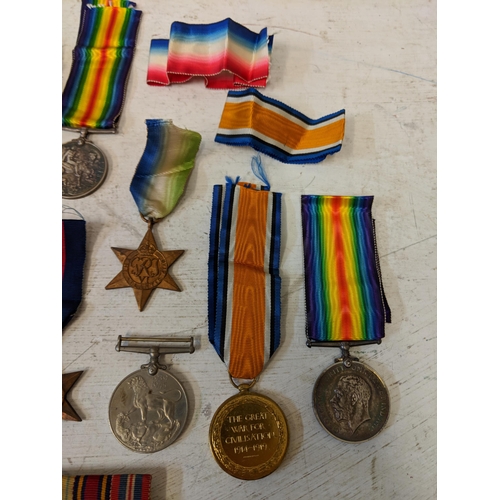 496 - WWI medal to include the Victory medal, Defence medal and the British Starr Lieut F.N. Tarr Pte F. R... 