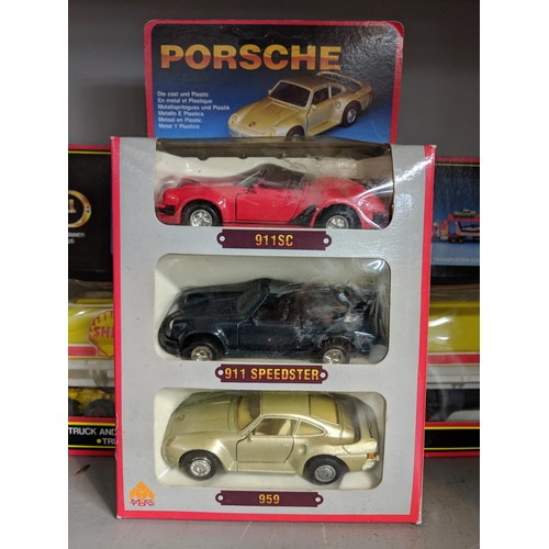 507 - Boxed and diecast model vehicles to include examples from Days Gone, Matchbox, Tetley, Cameo from Co... 